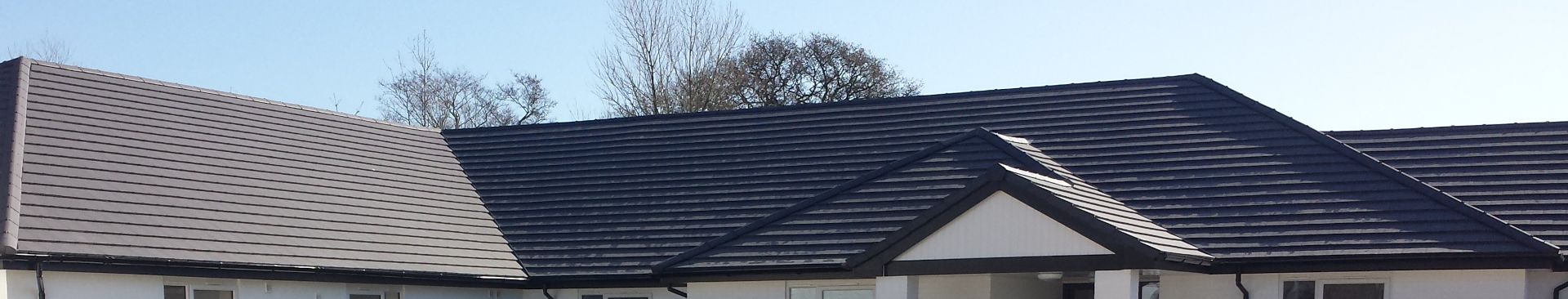 A new grey tiled roof installed near Tiverton, Devon.